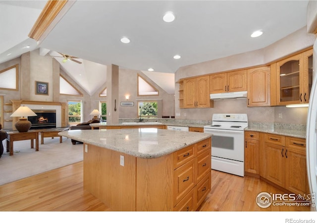 6239 Ashcroft Rd, Greeley, CO 80634 - kitchen featuring white appliances, under cabinet range hood, light wood finished floors, ceiling fan, and light stone countertops
