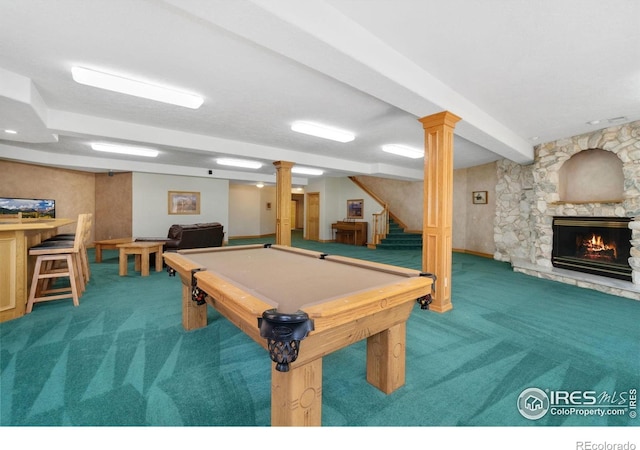 6239 Ashcroft Rd, Greeley, CO 80634 - game room with carpet floors, a stone fireplace, and billiards table