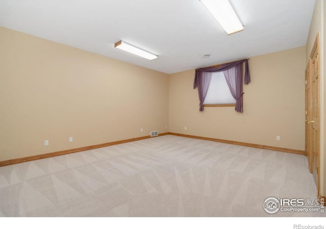 6239 Ashcroft Rd, Greeley, CO 80634 - empty room featuring light colored carpet and baseboards