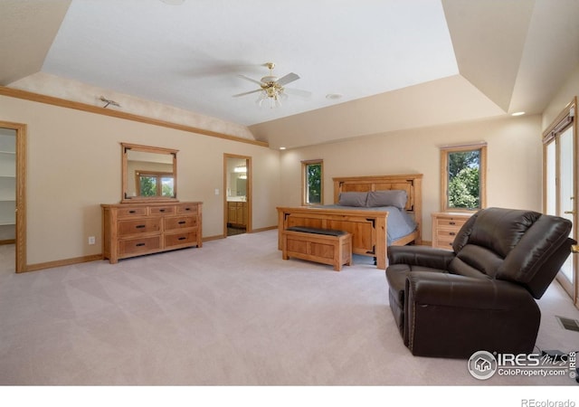 6239 Ashcroft Rd, Greeley, CO 80634 - bedroom with multiple windows, carpet flooring, lofted ceiling, baseboards, and a ceiling fan