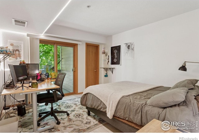 2802 Sundown Ln Unit 102, Boulder, CO 80303 - bedroom featuring access to exterior and an office area