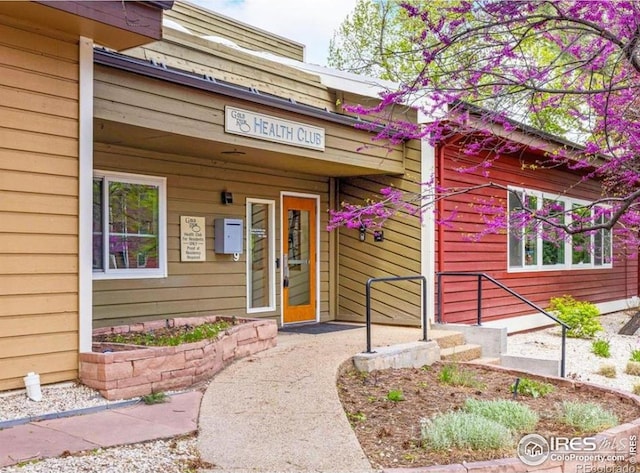 2802 Sundown Ln Unit 102, Boulder, CO 80303 - view of exterior entry featuring a porch