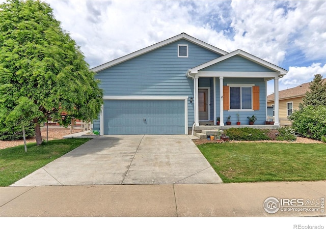 5681 Legacy Pkwy, Dacono, CO 80514 - view of front of home with covered porch, a front yard, an attached garage, and driveway