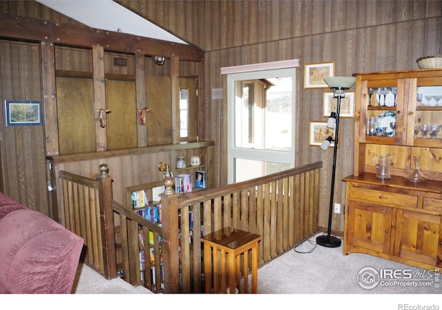 730 Spring St, Estes Park, CO 80517 - hall featuring carpet flooring, an upstairs landing, and wood walls