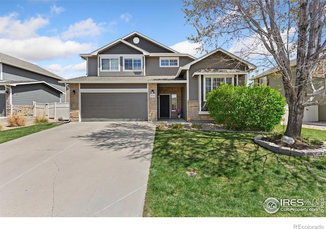 9930 Cascade St, Firestone, CO 80504 - craftsman-style home with driveway, an attached garage, and stone siding