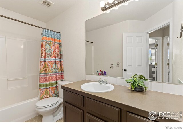9930 Cascade St, Firestone, CO 80504 - full bath featuring vanity, toilet, and shower / bath combination with curtain