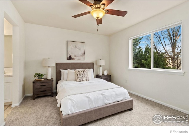 1382 Warbler St, Loveland, CO 80537 - carpeted bedroom featuring baseboards and a ceiling fan