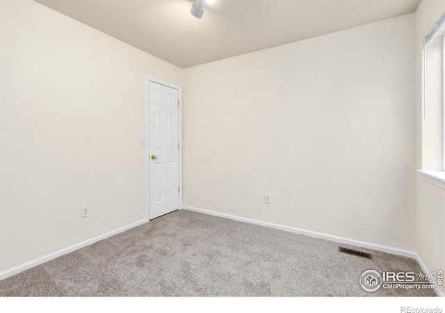 1382 Warbler St, Loveland, CO 80537 - empty room featuring carpet flooring and baseboards