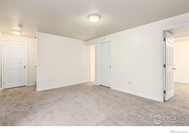 1382 Warbler St, Loveland, CO 80537 - unfurnished bedroom featuring carpet floors and baseboards