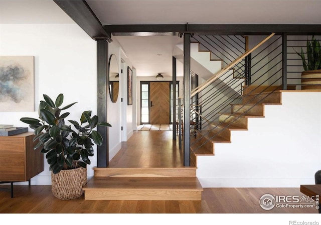 2828 4th St, Boulder, CO 80304 - stairway with wood finished floors and baseboards