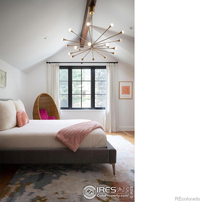 2828 4th St, Boulder, CO 80304 - bedroom with a chandelier and baseboards