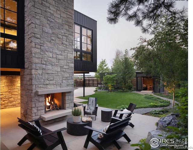 2828 4th St, Boulder, CO 80304 - view of patio featuring an outdoor living space with a fireplace