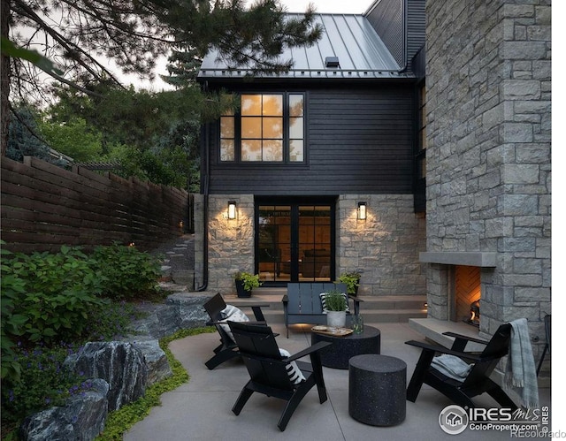 2828 4th St, Boulder, CO 80304 - view of patio featuring an outdoor stone fireplace