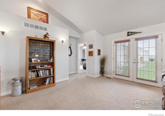 6911 W 22nd St, Greeley, CO 80634 - entrance foyer featuring carpet, vaulted ceiling, french doors, baseboards, and a ceiling fan