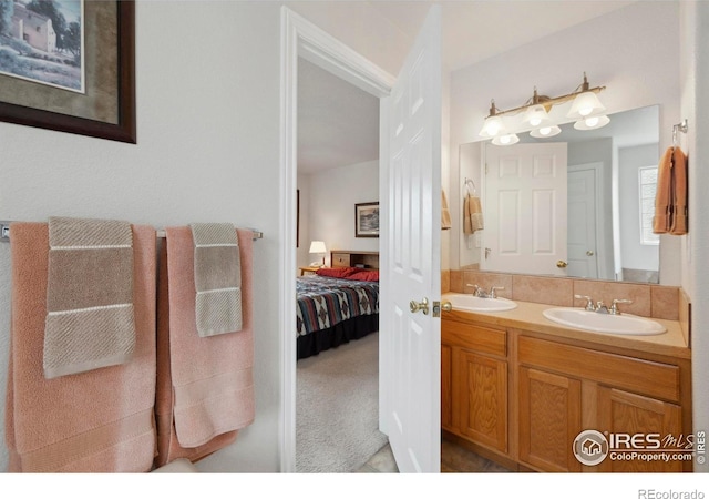 6911 W 22nd St, Greeley, CO 80634 - ensuite bathroom featuring double vanity