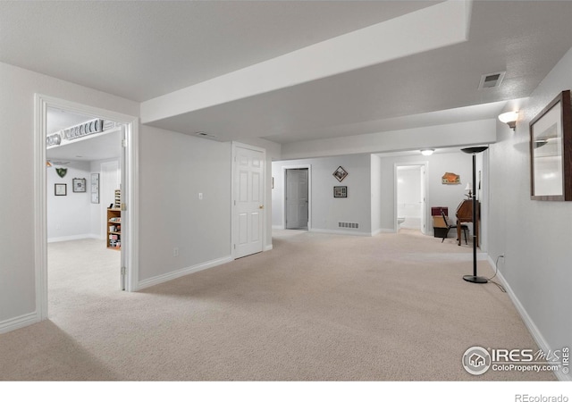 6911 W 22nd St, Greeley, CO 80634 - unfurnished living room with carpet flooring and baseboards