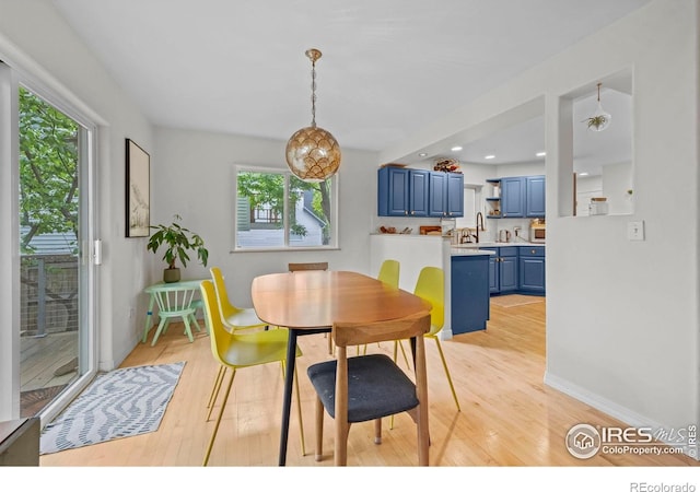 1409 Quince Ave, Boulder, CO 80304 - dining area featuring light wood-style floors, healthy amount of natural light, baseboards, and recessed lighting