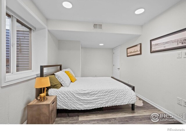 1409 Quince Ave, Boulder, CO 80304 - bedroom featuring wood finished floors, baseboards, and recessed lighting