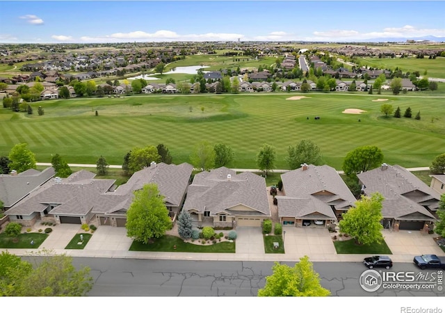 6787 Spanish Bay Dr, Windsor, CO 80550 - aerial view of residential area featuring a nearby body of water and a golf course