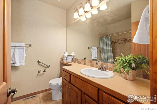 6787 Spanish Bay Dr, Windsor, CO 80550 - full bathroom featuring toilet, vanity, baseboards, tile patterned floors, and curtained shower