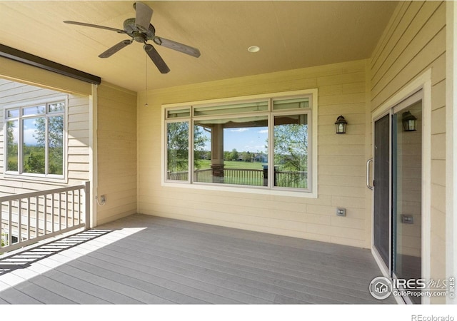 6787 Spanish Bay Dr, Windsor, CO 80550 - wooden terrace featuring ceiling fan