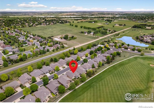6787 Spanish Bay Dr, Windsor, CO 80550 - aerial overview of property's location with a nearby body of water, a local golf course, and nearby suburban area