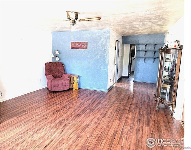 402 N Washington Ave, Fleming, CO 80728 - unfurnished room featuring wood finished floors