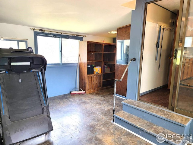402 N Washington Ave, Fleming, CO 80728 - workout area featuring baseboards