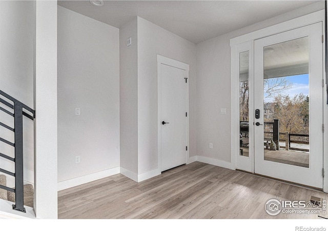 3580 W 62nd Pl, Denver, CO 80221 - spare room featuring wood finished floors and baseboards