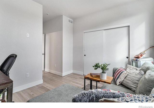 3580 W 62nd Pl, Denver, CO 80221 - living area with wood finished floors and baseboards