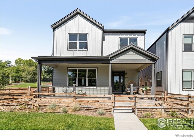 3580 W 62nd Pl, Denver, CO 80221 - view of front of home featuring covered porch and board and batten siding