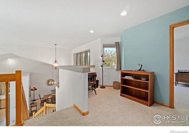 140 Camino Real Ft, Collins, CO 80524 - corridor with carpet flooring, an upstairs landing, recessed lighting, and baseboards
