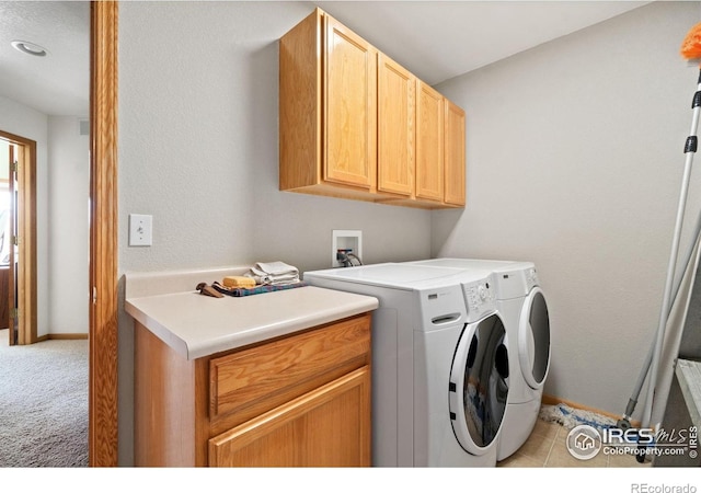 140 Camino Real Ft, Collins, CO 80524 - laundry area with cabinet space, separate washer and dryer, baseboards, and light colored carpet