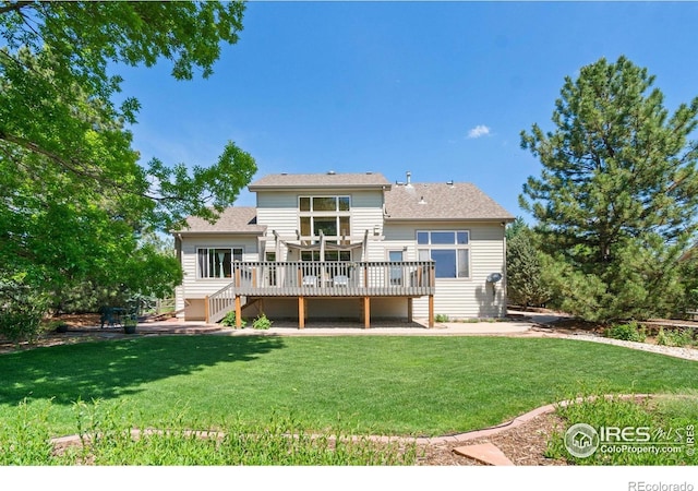 140 Camino Real Ft, Collins, CO 80524 - back of house with a deck and a lawn