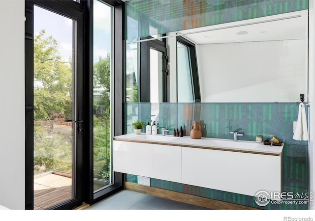 944 Arapahoe Ave Unit A, Boulder, CO 80302 - full bath with double vanity and tile patterned flooring