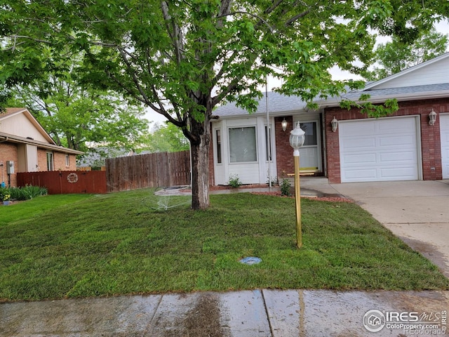 1126 Patricia Dr, Loveland, CO 80537 - single story home featuring brick siding, driveway, a garage, and a shingled roof