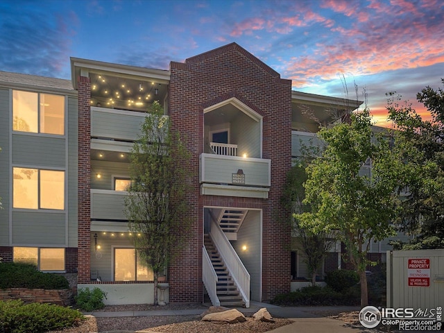 33 S Boulder Cir Unit 316, Boulder, CO 80303 - view of front of house featuring brick siding and stairs