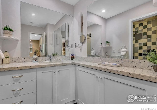 3345 15th St, Boulder, CO 80304 - full bathroom featuring double vanity and recessed lighting