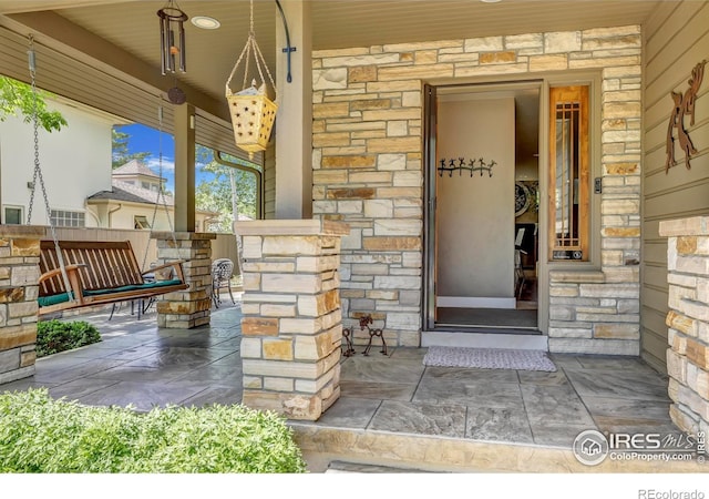 3345 15th St, Boulder, CO 80304 - entrance to property with stone siding and covered porch