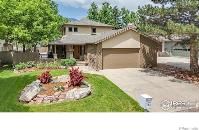 3345 15th St, Boulder, CO 80304 - view of front facade with a porch, a garage, and driveway