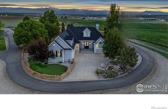 3401 E County Road 16, Loveland, CO 80537 - aerial view at dusk of a mountain view