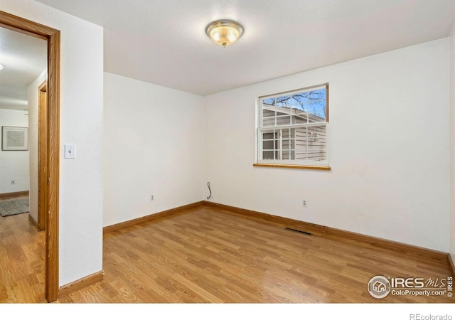 911 Timber Ct, Longmont, CO 80504 - empty room featuring light wood-style floors and baseboards