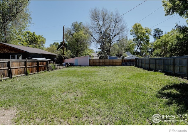 934 6th St, Berthoud, CO 80513 - view of yard featuring an outdoor structure