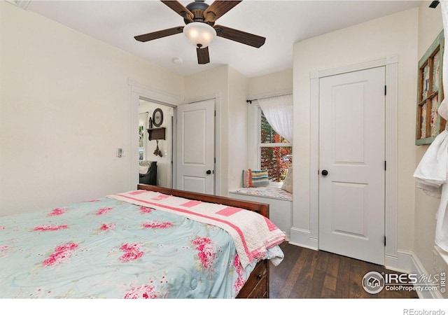 3730 Garfield Ave, Wellington, CO 80549 - bedroom with dark wood-style flooring and a ceiling fan