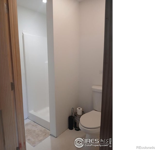3730 Garfield Ave, Wellington, CO 80549 - full bath featuring a shower stall and toilet