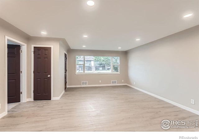 3014 High Dr, Evans, CO 80620 - unfurnished room with light wood-style floors, baseboards, and recessed lighting