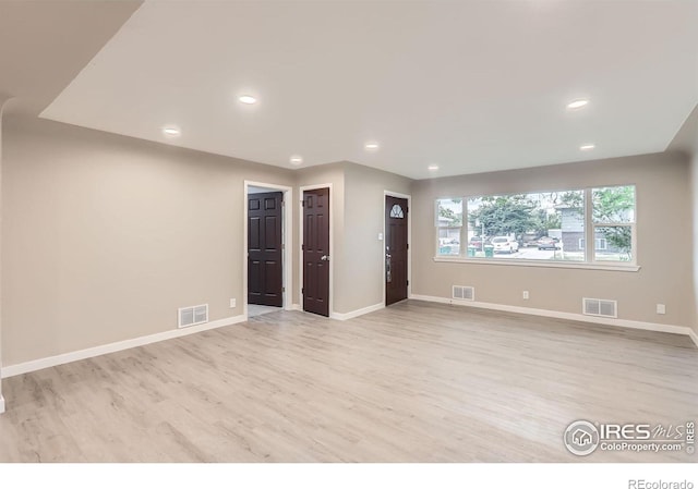 3014 High Dr, Evans, CO 80620 - spare room with light wood-style floors, baseboards, and recessed lighting