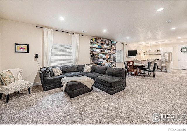 6253 Black Mesa Rd, Frederick, CO 80516 - living area with light colored carpet, recessed lighting, and baseboards