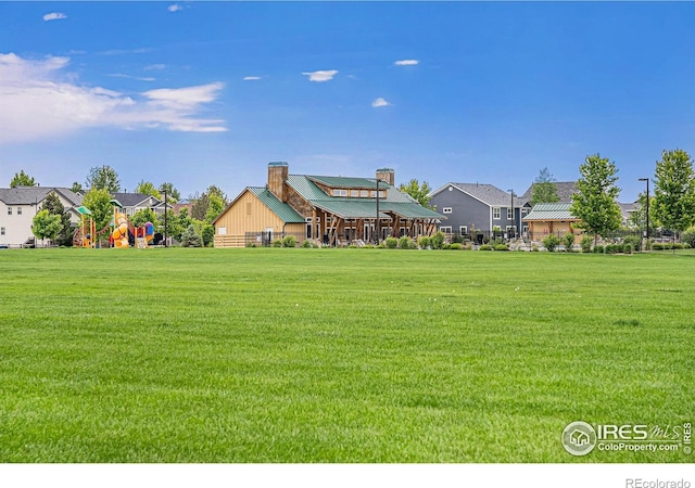 6253 Black Mesa Rd, Frederick, CO 80516 - view of green lawn featuring a residential view