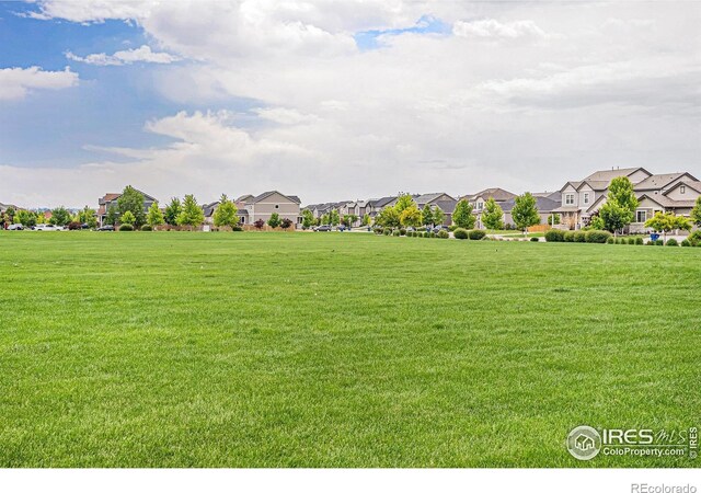 6253 Black Mesa Rd, Frederick, CO 80516 - view of grassy yard with a residential view